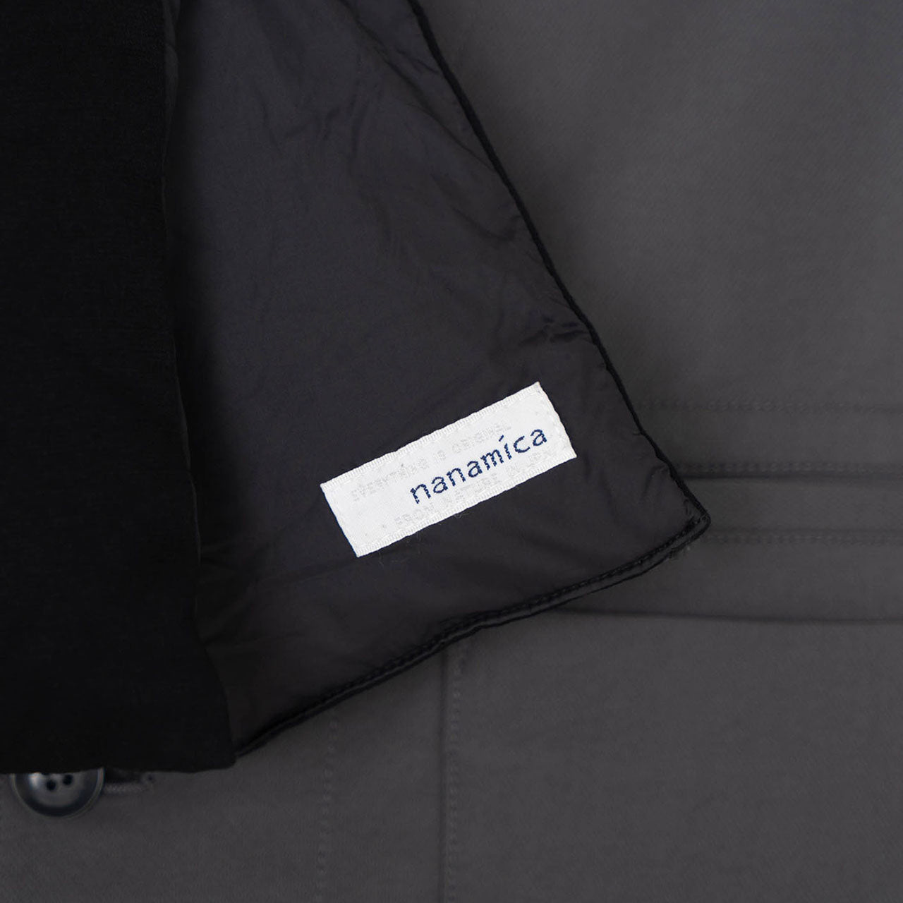 nanamica down muffler (black) - a.plus