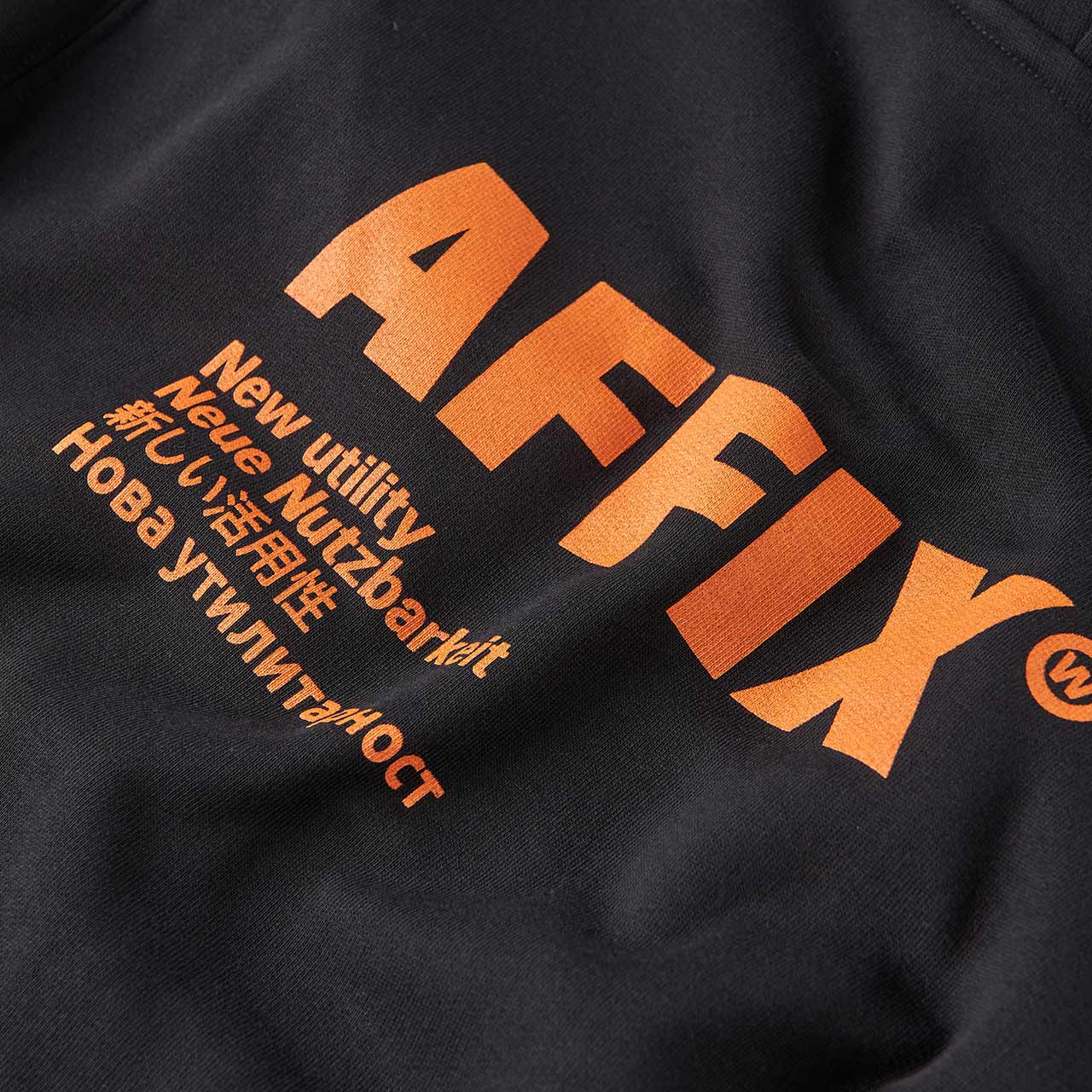 affix works standardised logo hoodie (black / orange)