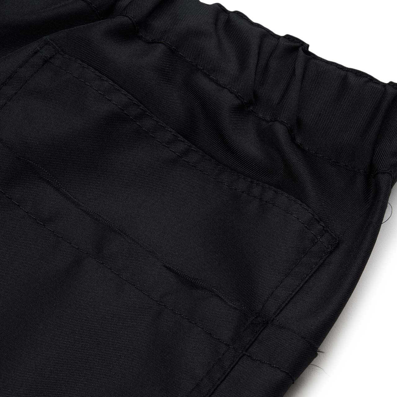 comme des garçons shirt comme des garçons shirt x christian marclay frayed hem pants (black)