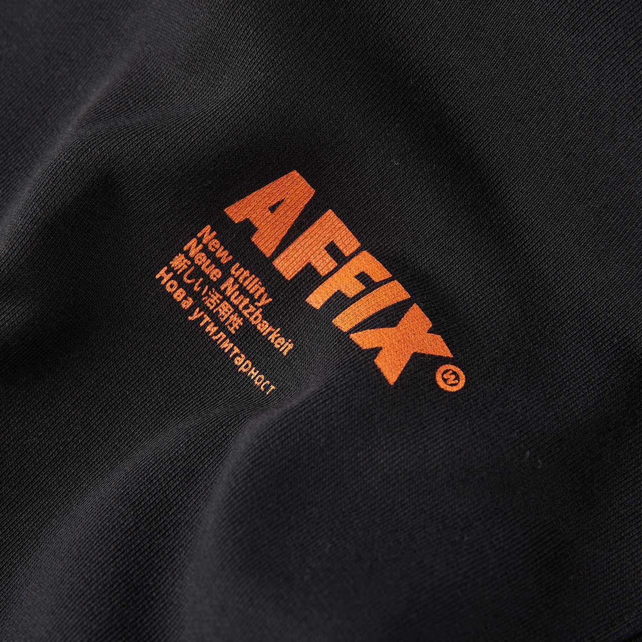 affix works standardised logo hoodie (black / orange)